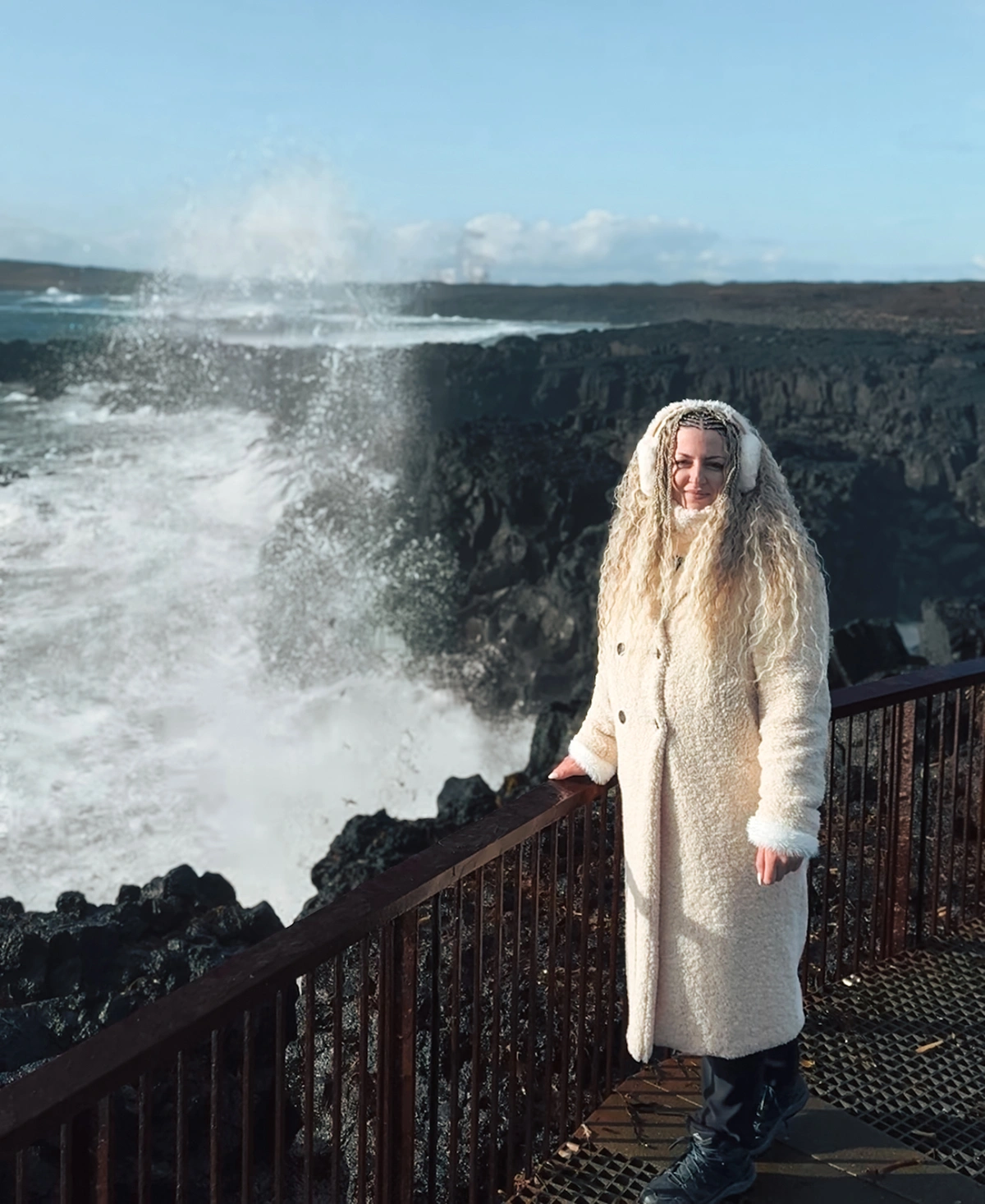 Woman standing in front of Lava Pool in Iceland