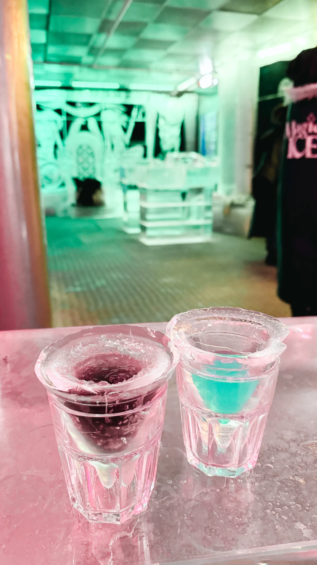 Two shot glasses made of ice in Magic Ice bar in Reykjavik